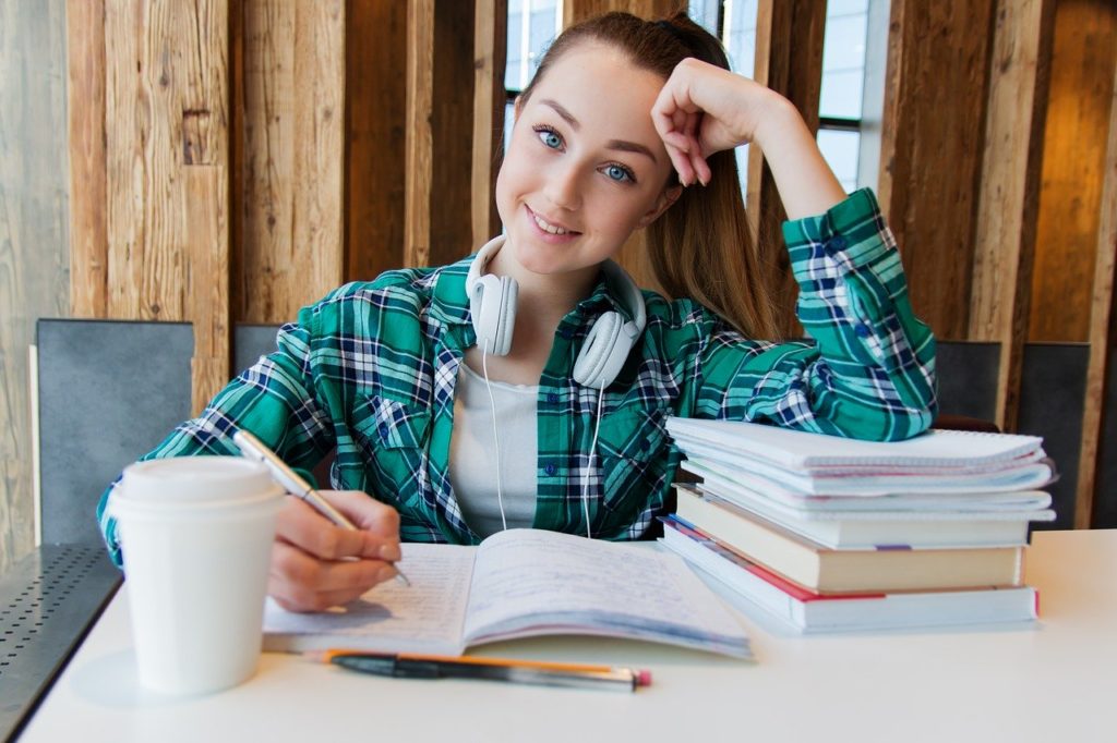 Girl Young Student Sitting Table