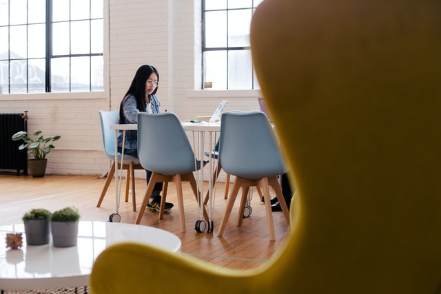 woman sitting by herself in office